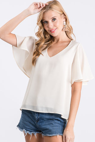 IVORY FLUTTER SLEEVE WOVEN TOP