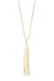 WHITE BEADED NECKLACE WITH LEATHER TASSEL